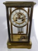 A Late 19th Century French Brass Mercury Pendulum Chiming Mantle Clock by G.P. Wehlen & Co.,