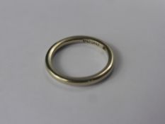 An 18 ct White Gold Wedding Band, size L, approx 3.2 gms.