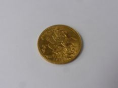 A George V 1913 Full Gold Sovereign.