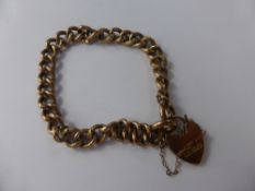 An Antique 9 ct Rose Gold Curb Link Bracelet with Locket Clasp, approx 8.7 gms.