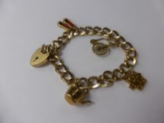 A 9 ct Yellow Gold Curb Link Charm Bracelet, with four yellow gold charms, approx 29.5 gms.