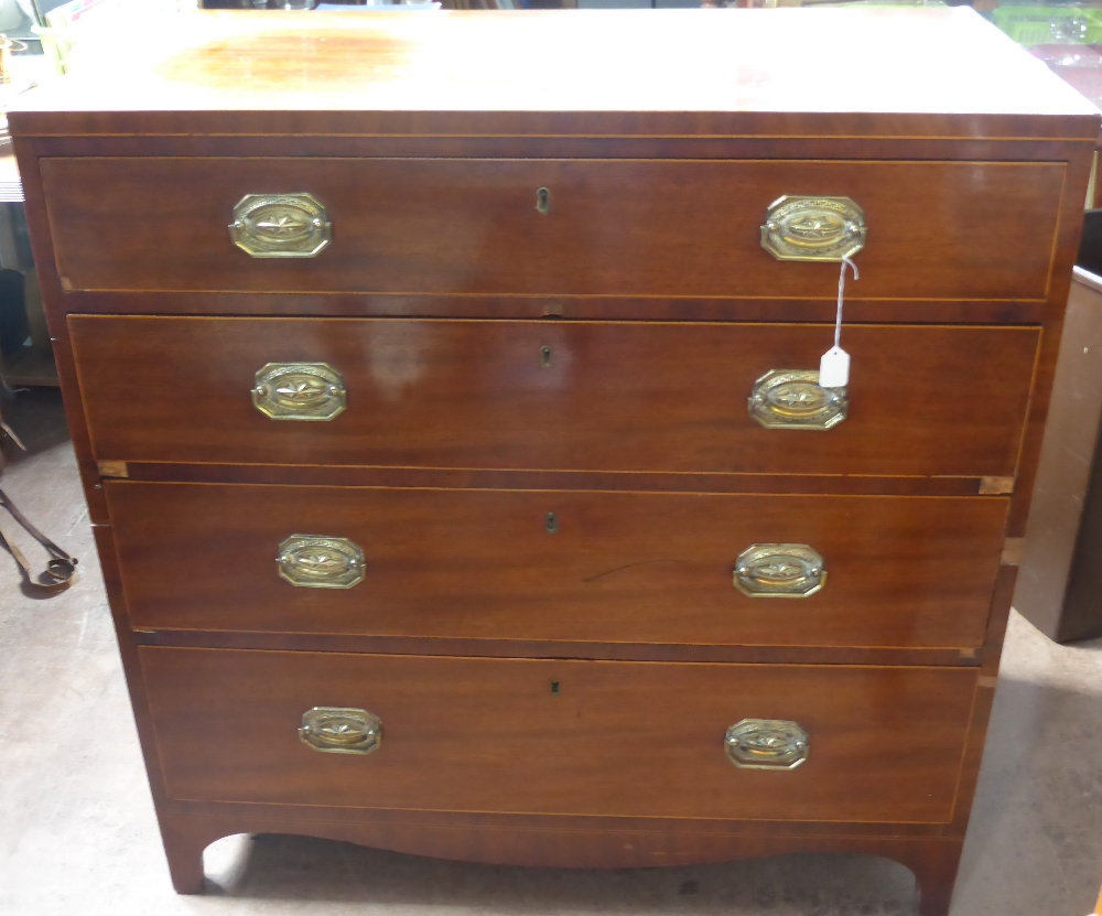 A Georgian Mahogany Chest of Drawers, having four graduated drawers, on straight legs, and star