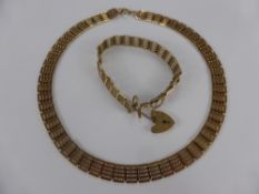 A Lady's 9 ct Gold Gate Link Necklace, approx 38 cms, with matching bracelet with locket clasp,