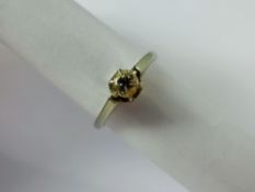 A Lady's 18 ct White Gold and Platinum Diamond Solitaire Ring, 35 pts, size Q, approx wt 3.9 gms.