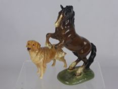 A Porcelain Beswick Figurine of a Rearing Horse, Nr 1014, approx 26 cms h together with a Beswick