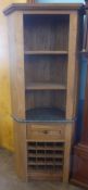 A Solid Oak and Marble Corner Cabinet, with two shelves and single drawer, with wine rack beneath,