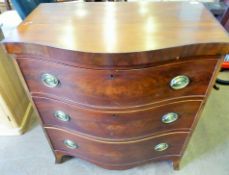 A Victorian Mahogany Serpentine Fronted Chest of Drawers, the chest having three graduated drawers