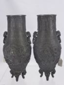 A Pair of Japanese Edo/Meiji Period Vases, the vases with chasing dragons in relief amongst cloud