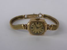A Lady's 9 ct Gold Avia Cocktail Watch, on 9 ct gold bracelet, wt without movement 9.3 gms.