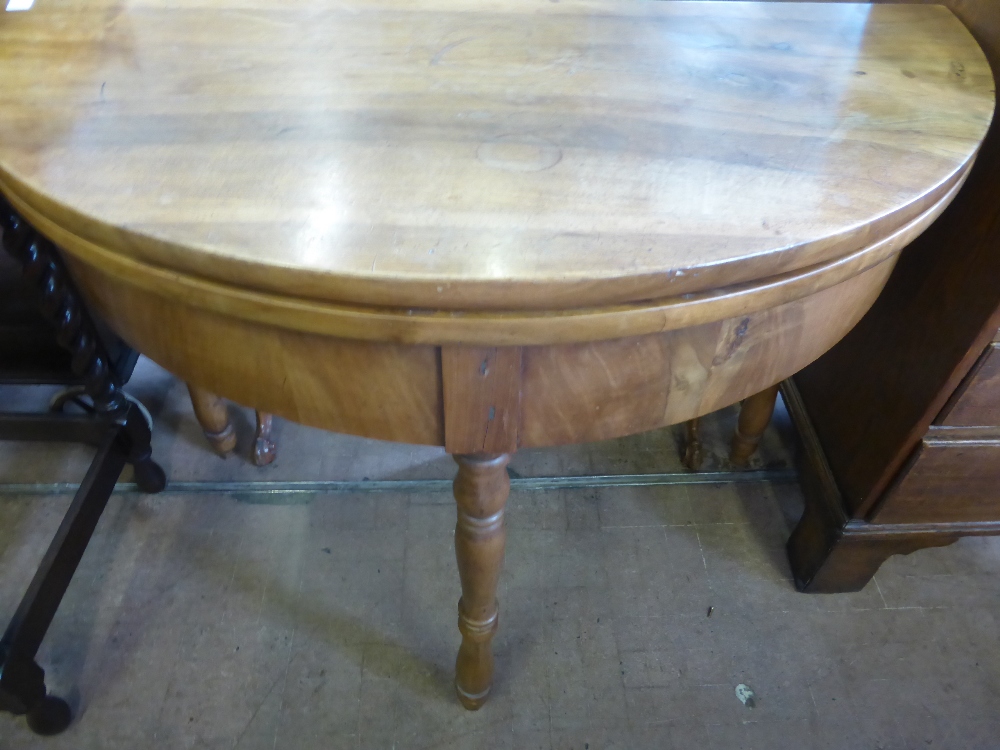 A Victorian Mahogony Demi Lune Open Leaf Hall Table, on turned legs, approx 100 x 101 x 76 cms.