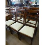 Six Antique Oak Ladder Back Dining Chairs with two Carvers, in the Arts & Crafts style, turned