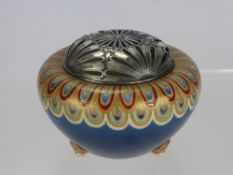 A Japanese Potpourri, royal blue glaze with decorative feather design on tripod feet, with solid