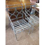Two Galvanised Metal Garden Arm Chairs, the chairs having knot form stretchers with lattice back. (