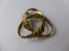 A Lady's Vintage 9 ct Gold Bark Finish Ribbon Brooch, approx 7 gms.