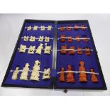 A Bone Chess Set, in the original box together with a Chinese game and a child's miniature black