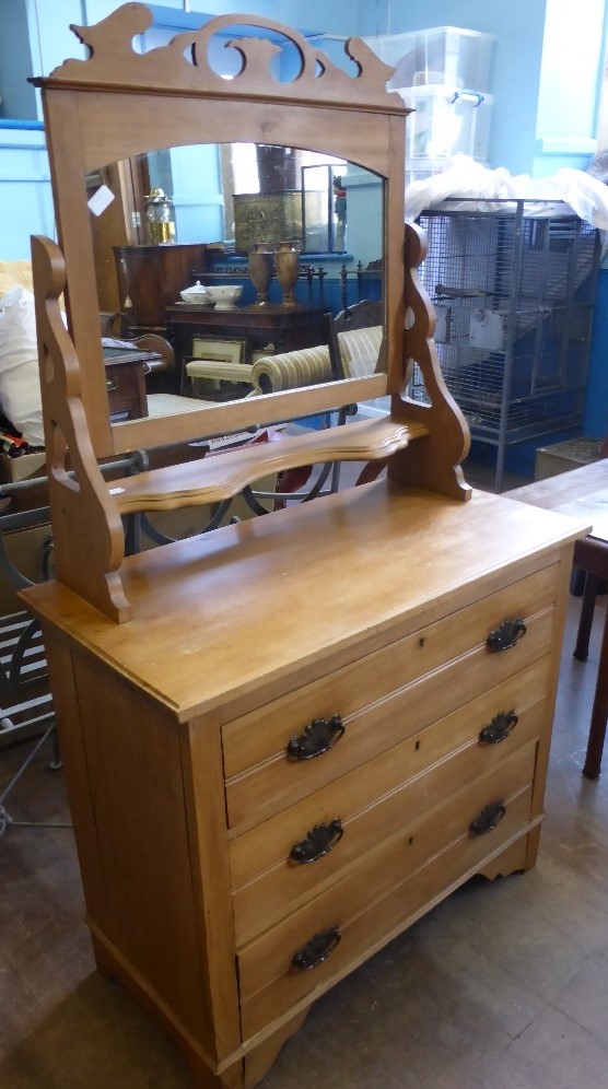 A Vintage Pine Chest of Drawers with Mirror, the chest having three drawers and on bracket feet,