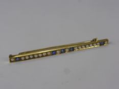 A 15 ct Yellow Gold, Sapphire and Seed Pearl Stock Pin, wt approx 4.2 gms, 5 x 2.65 sapps, 18 x 2.15