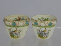 A Pair of Crescent & Sons Porcelain Bowls, fluted design and hand painted with birds, marks to base.