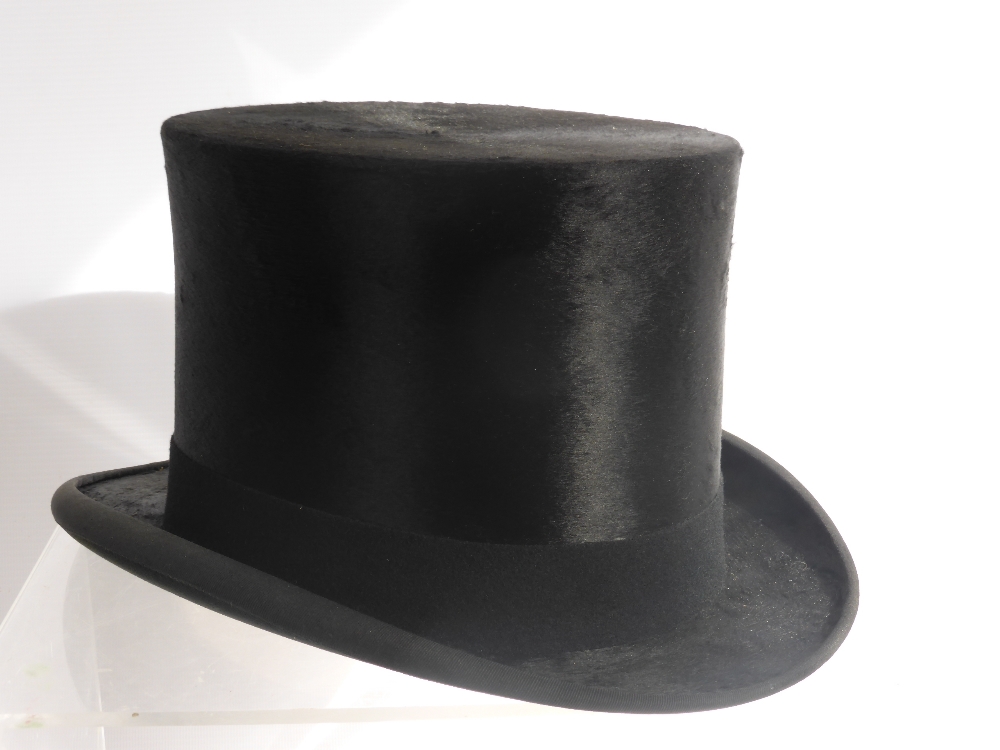 A Gentleman's Black Silk Top Hat, size approx 7.1/8, the hat in original Joshua Taylor, Cambridge