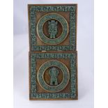 A Pair of Oak Wall Plaques Depicting Mayam Iconography, approx 30 x 30 cms.