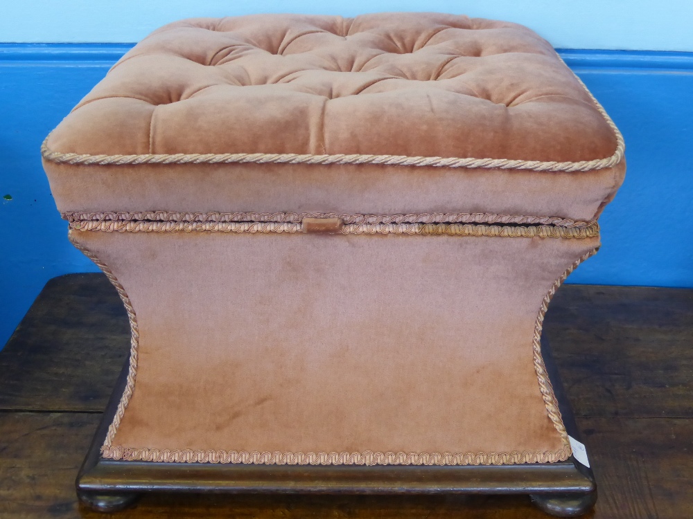 An Antique Mahogany Framed Footstool, velvet upholstery on bun feet, lid lifts for storage, approx