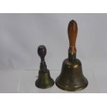 A WWII Brass A.R.P. Hand Bell, together with one other. (2)