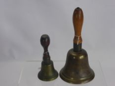 A WWII Brass A.R.P. Hand Bell, together with one other. (2)