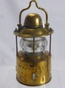 An Antique Brass Ship's Lantern, approx 45 cms high.
