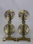 A Pair of Regency Brass Fire Dog Fronts, the fronts of a pierced floral shield design, approx 56 x