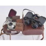 A Pair of Carl Zeiss 'Zena' Binoculars, in the original leather case, lens appear to be in good