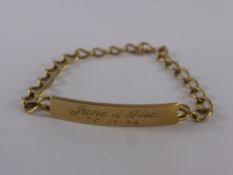 A 9 ct Yellow Gold Identity Bracelet, approx 9.4 gms.