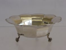 A Silver Bon Bon Dish, scalloped edge with pierced detail, supported on three scroll feet, Sheffield