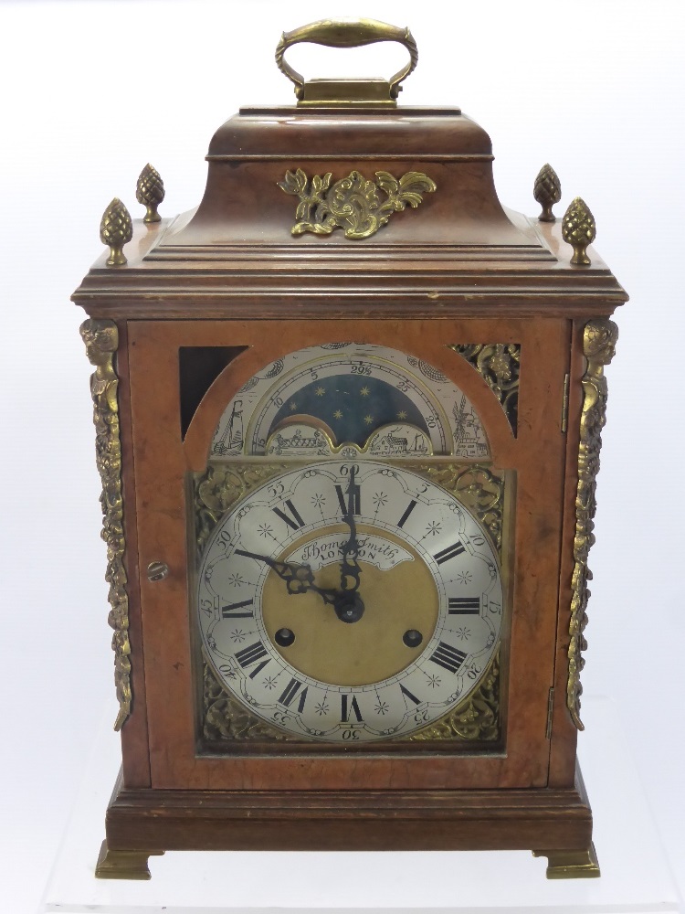 A Thomas Smith London Bracket Clock in Walnut Case, the 6" brass arched dial marked Thomas &