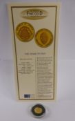 A 2000 Royal Mint .999 Fine Gold Ten Dollar Mask of Dan, Liberia Proof Coin, approx 1.24 gms, with