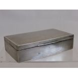 A Silver Double Cigarette Box, London hallmark, dated 1918, retailer Finnigans of New Bond Street,