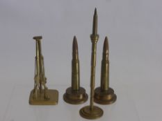 A Quantity of Brass Trench, two trench art lighters, a trench art bill hook, trio of Enfield