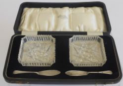 A Pair of Crystal Butter Dishes, with two silver butter knives in the original box, Birmingham