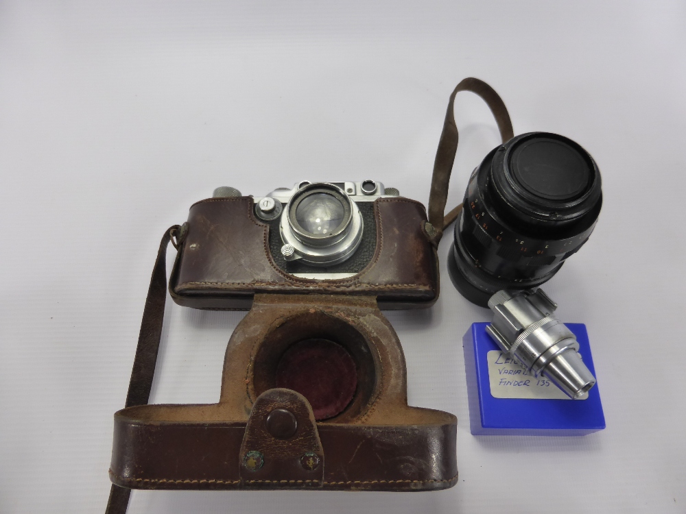 An Antique Vintage Leica 338239 Camera, with Ernst Leitz 1:2 f=5 cms lens together with a Leica