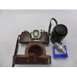 An Antique Vintage Leica 338239 Camera, with Ernst Leitz 1:2 f=5 cms lens together with a Leica