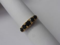 A Lady's 9 ct Gold 5 Stone Garnet Ring, size O, wt 2.5 gms.