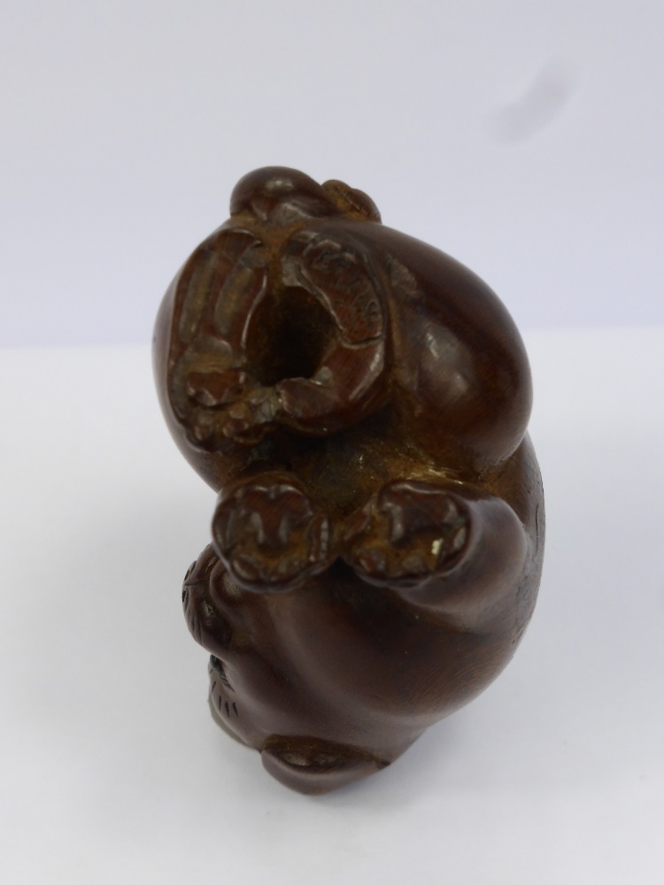 A Meiji Period Japanese Box Wood Netsuke, beautifully carved netsuke of a seated puppy, with a - Image 2 of 3