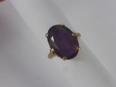 A Lady's 9 ct Gold and Amethyst 18 x 12 mm Dress Ring, size P, wt 5 gms, together with a base