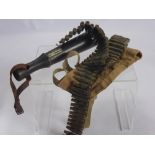 A Miscellaneous Collection of WWII Items, including home guard truncheon, a magazine clip (83 RD)