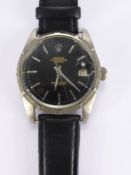 A Gentleman's Chrome Plated Vintage Automatic Wrist Watch. The watch having a black Rolex face