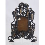 A Pair of Contemporary Cast Iron Picture Frames, with bronzed highlighting, approx 36 x 27 cms.