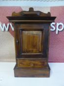 An Antique Smokers Cabinet, the cabinet has a single drawer beneath with the interior of the