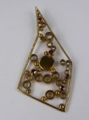 A Lady's 9 ct Ruby and Onyx Celestial Form Pendant, 5 x rubies approx 28 mm, approx 8 x 4 cms,