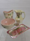 A Maling Ware Peony Rose Sandwich Plate, a fruit bowl depicting roses, a lustre water jug