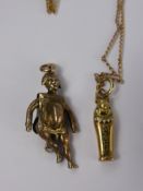 A Lady's 14 ct Gold and Enamel Pendant, in the form of an Egyptian sarcophagus with a mummy