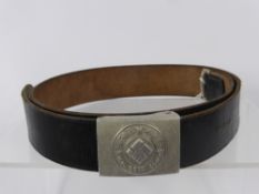 A Feuerschutzpolizei (Fire Police) Buckle and Belt, the leather belt is stamped with the words "